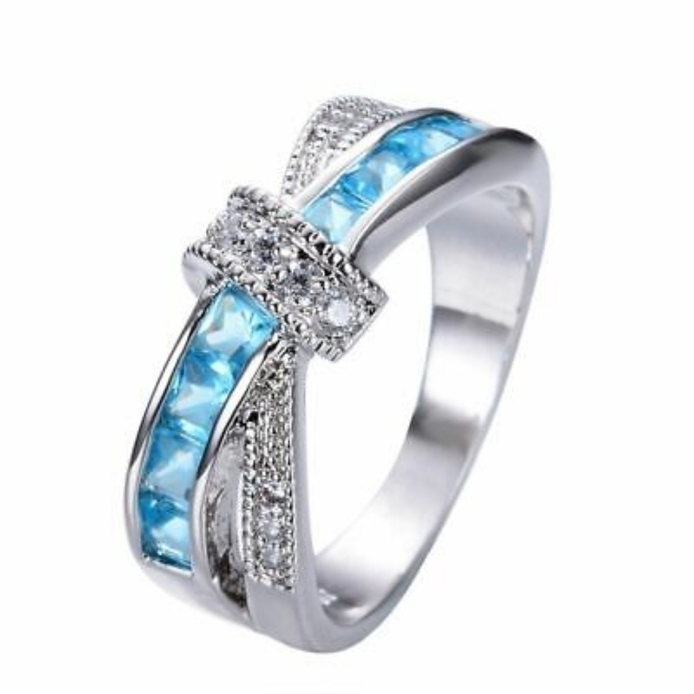 Light blue Criss Cross 10k White Gold Plated Bow Ring